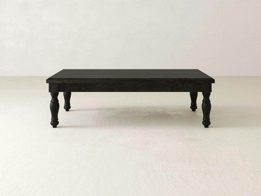 Abigail Coffee Table, Charred Ember on Alder, styled in a dining space
