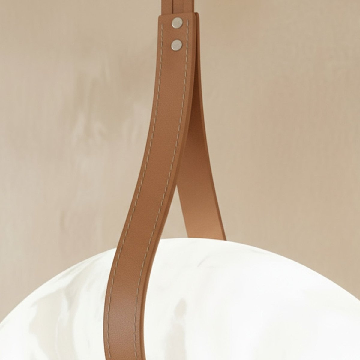Aktis Alabaster Pendant Light, second styled above a dining table