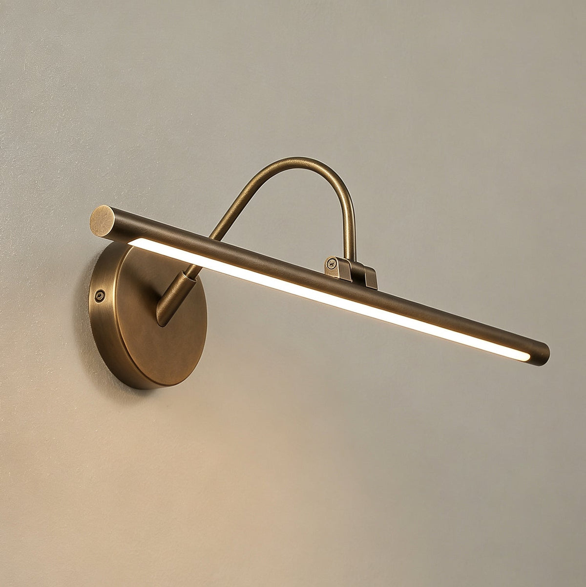 Averton Linear Brass Wall Sconce, warm glow when lit