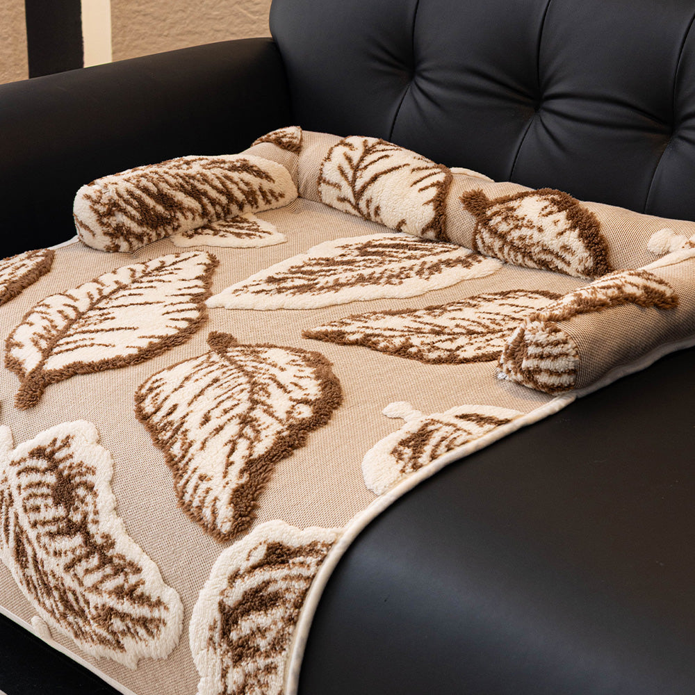 Botanical Leaf Plush Bolster Pet Sofa Bed, with a pet resting on it