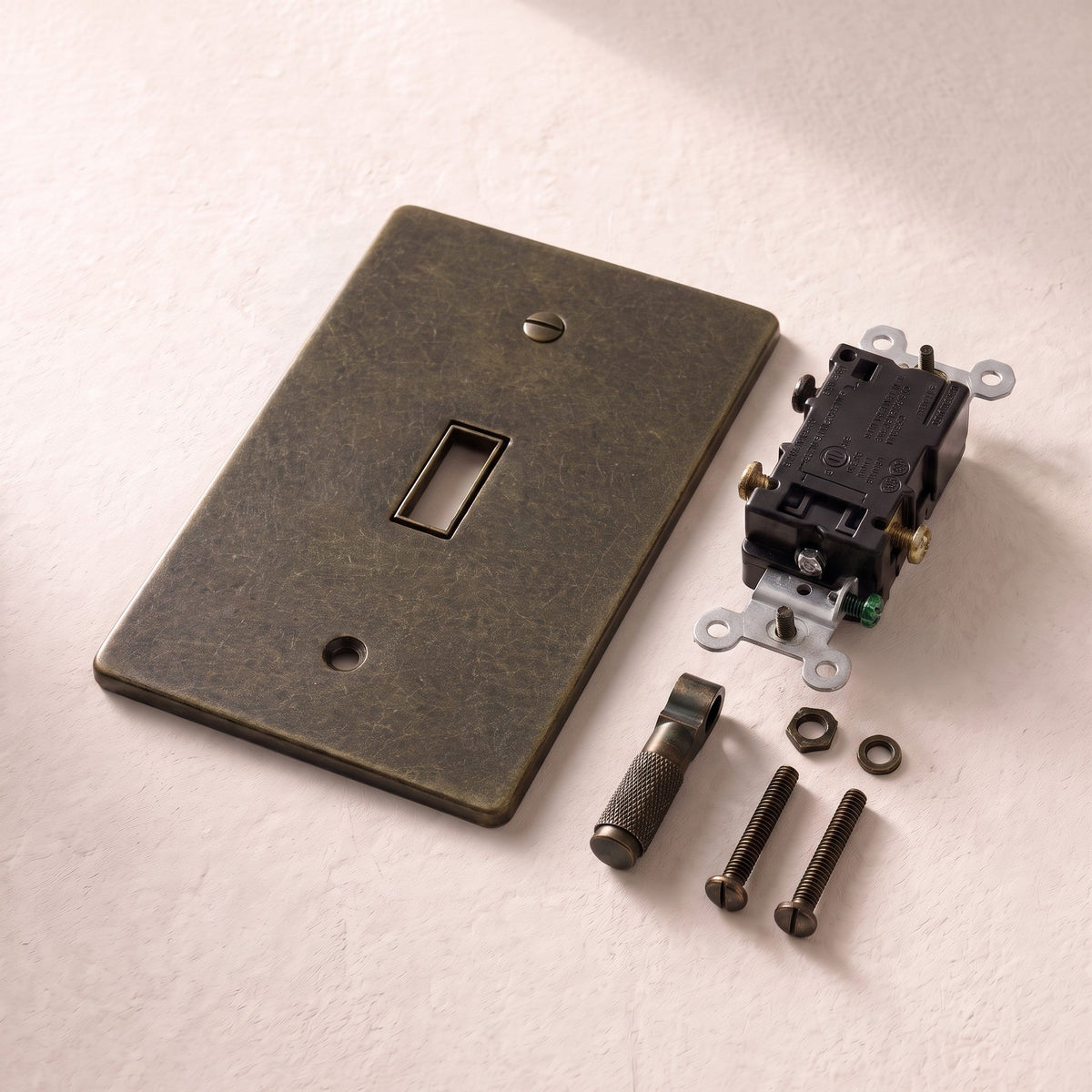 Brass Electrical Sample Kit, installed on the wall