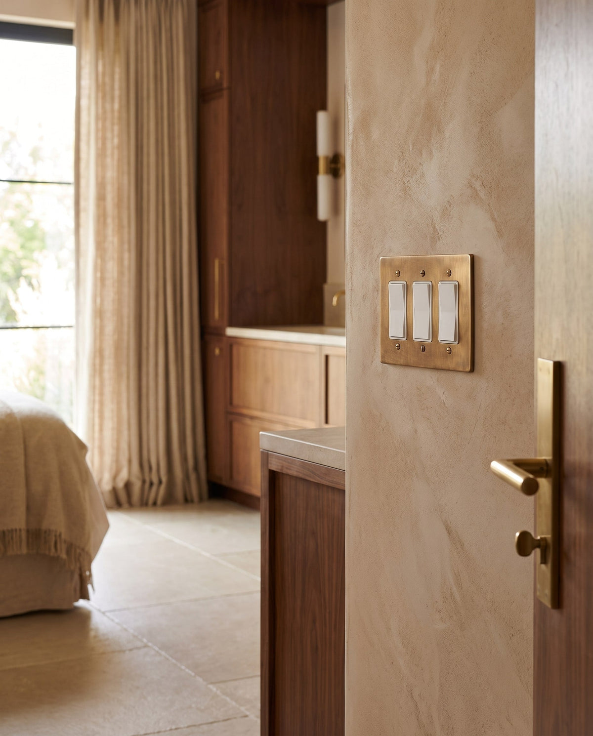 Brass Wall Plate (1-5 Gang), installed on the wall