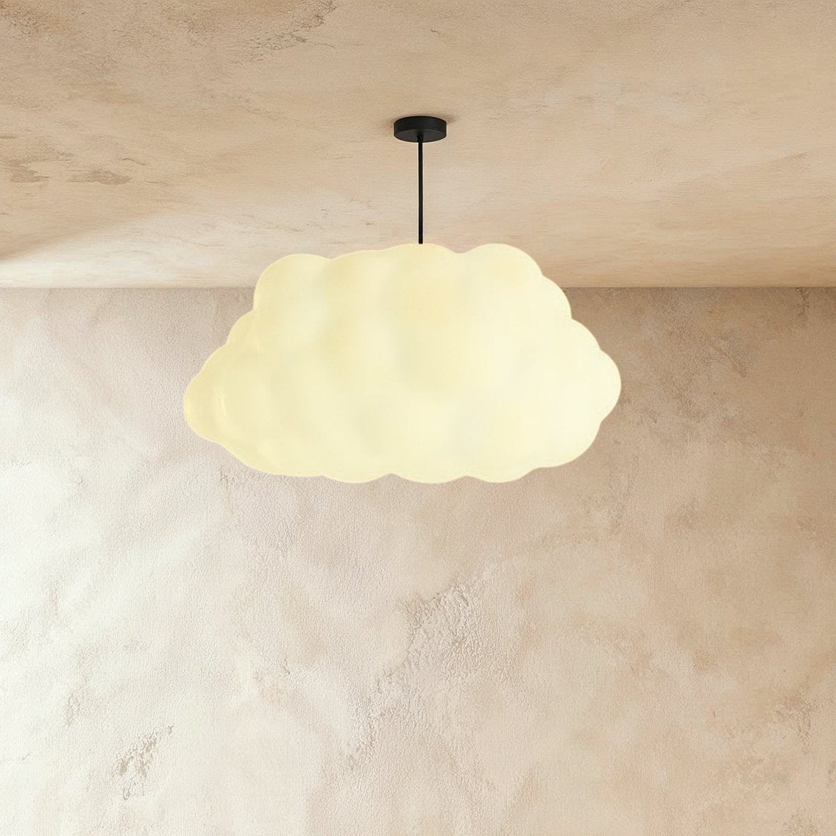 Cloud Nine Metal Pendant Light, second lit and hanging in a styled room