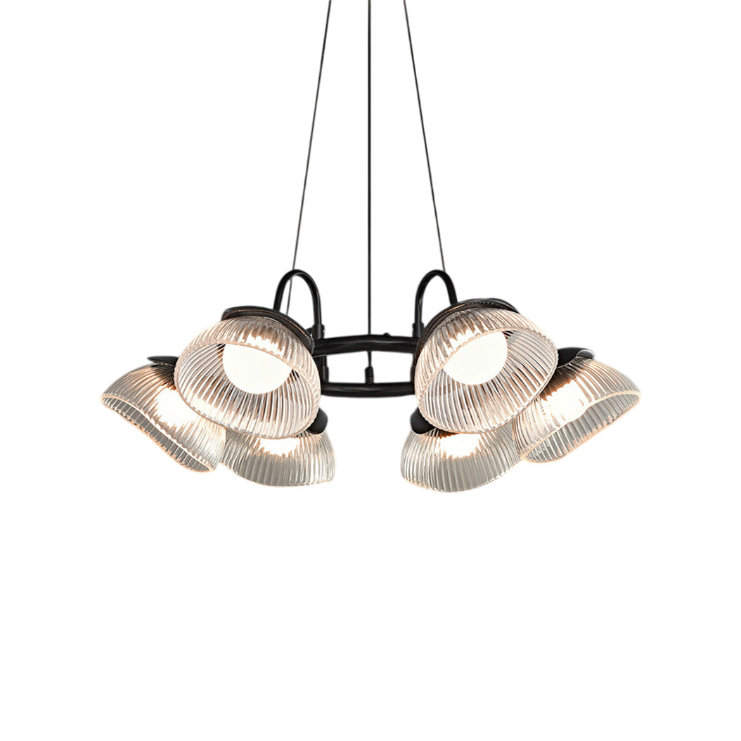 Coronis Fluted Glass LED Chandelier, lit in a styled room
