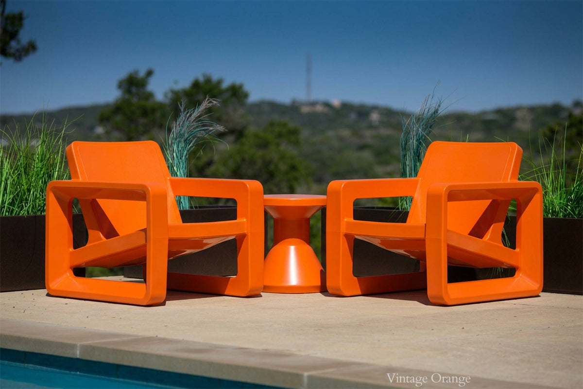 Deck Outdoor Lounge Chair, orange, styled in a real room