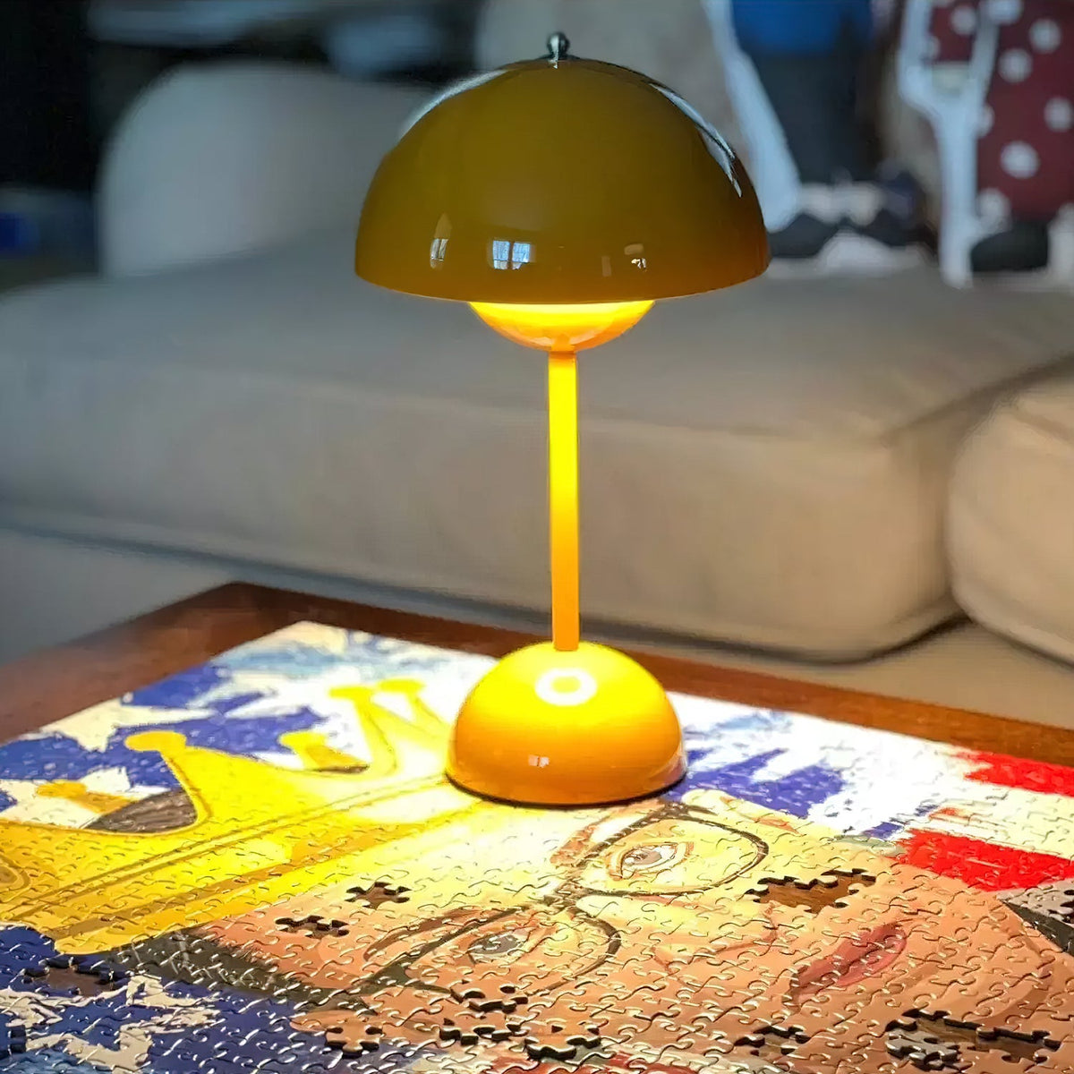 Duo Dome Portable Table Lamp, second lit in a styled room