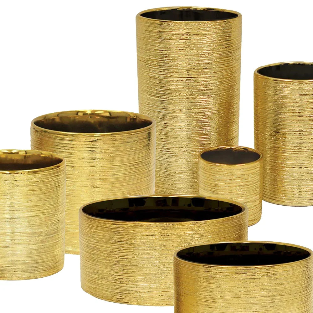 Etched Metallic Gold Collection, full piece on a surface
