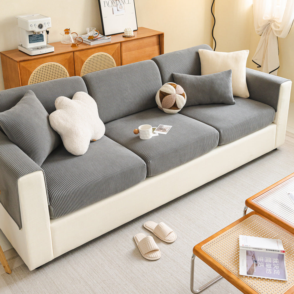 Fine-Ribbed Corduroy Sofa Slipcover, styled in a living space