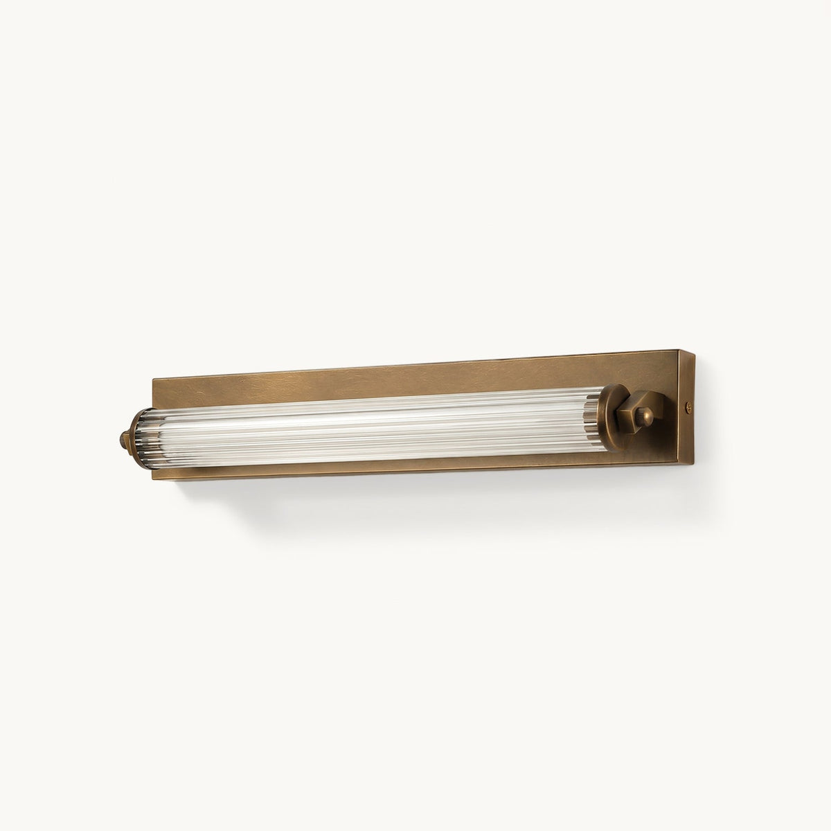 Kerrick Glass Tube Wall Sconce, lit in a styled room