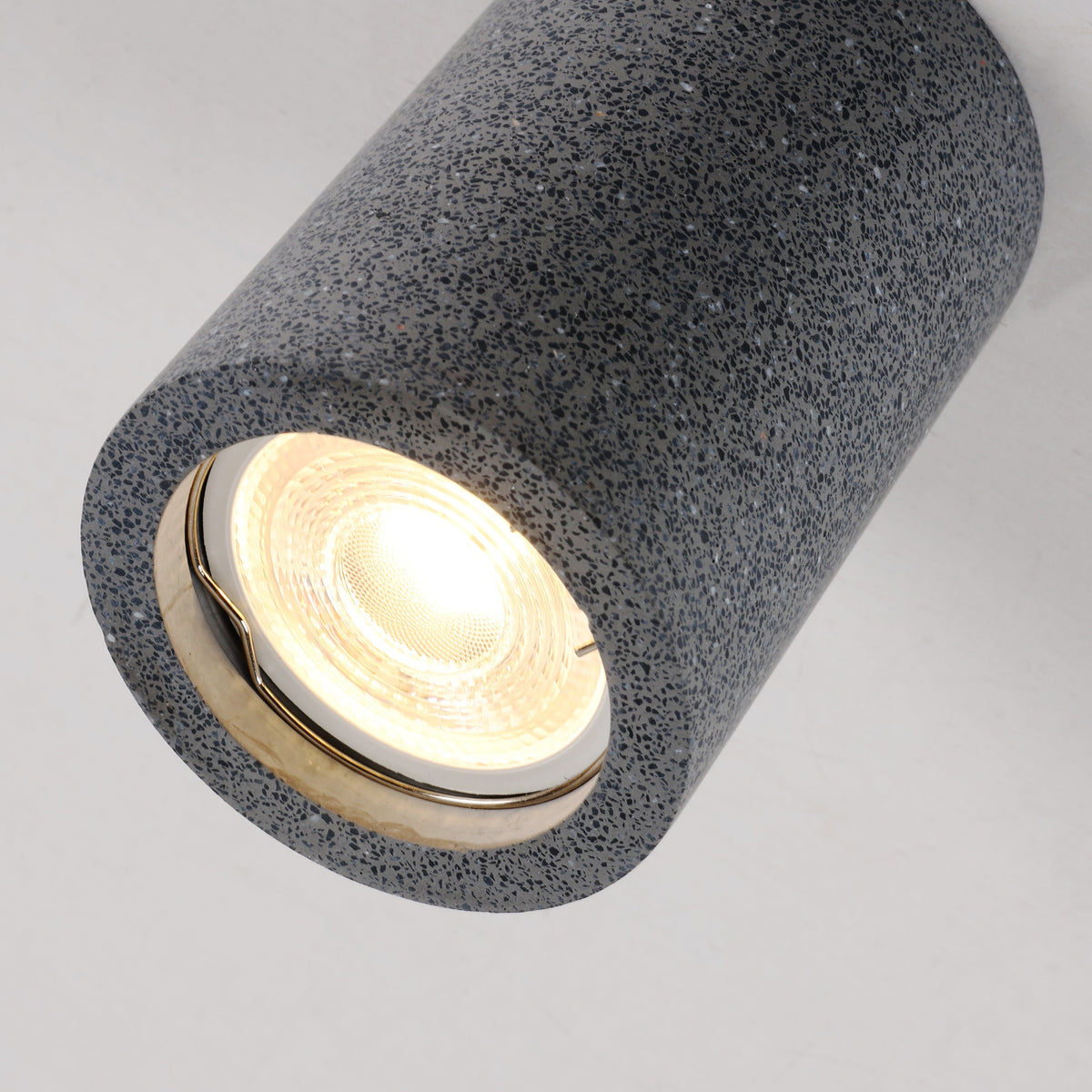 Lithos Minimalist Concrete Ceiling Light, mounted on the wall