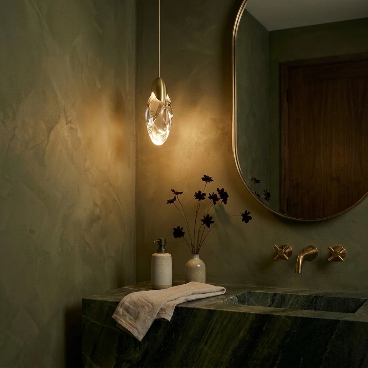 Lufina Metal Pendant Light, second lit and hanging in a styled room