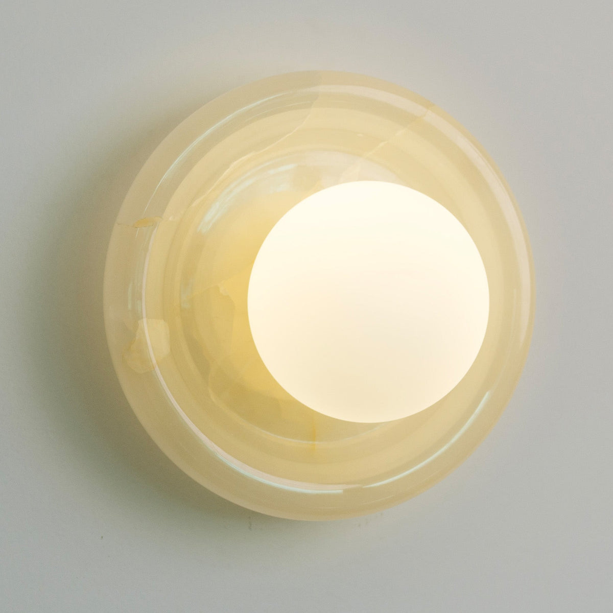 Nara Alabaster Cloud Stone Bubble Plate Wall Light, angled view