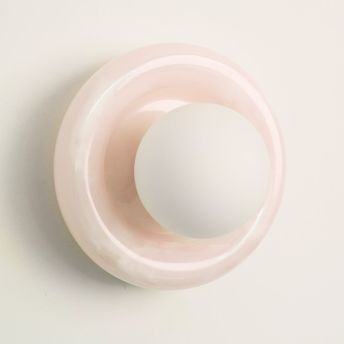 Nara Alabaster Cloud Stone Bubble Plate Wall Light, fixture lit in a room