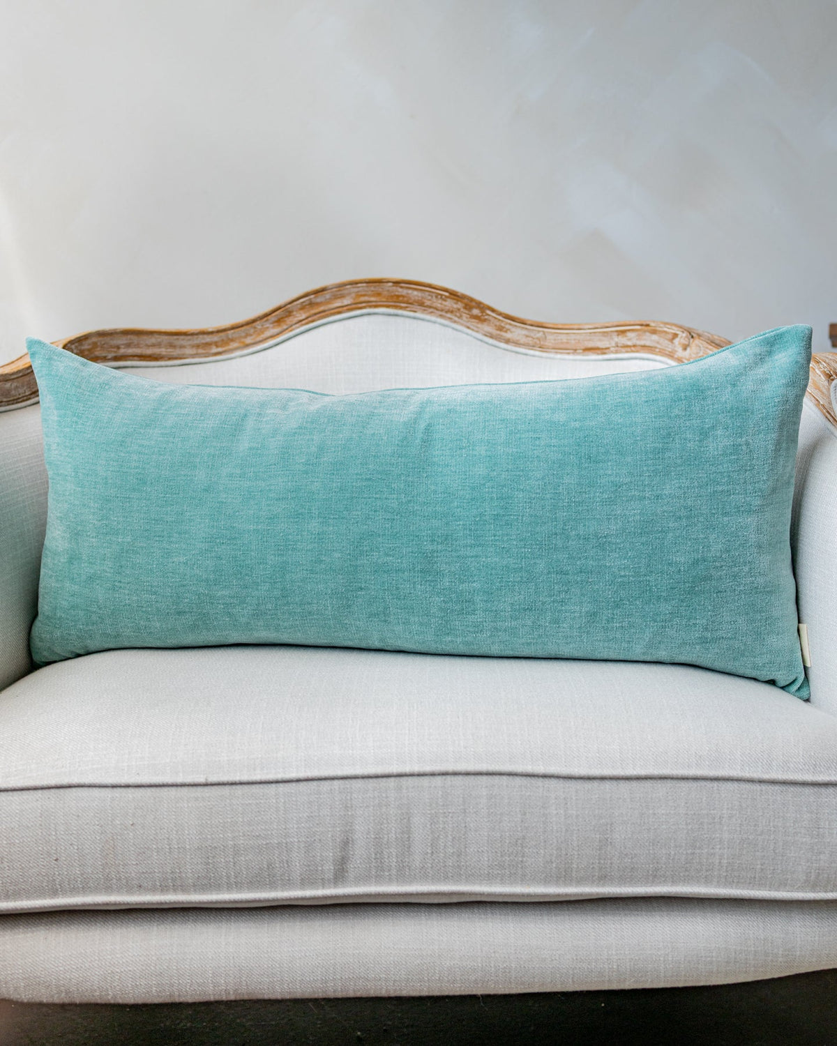 Paula Velvet Lumbar Pillow, draped and styled view