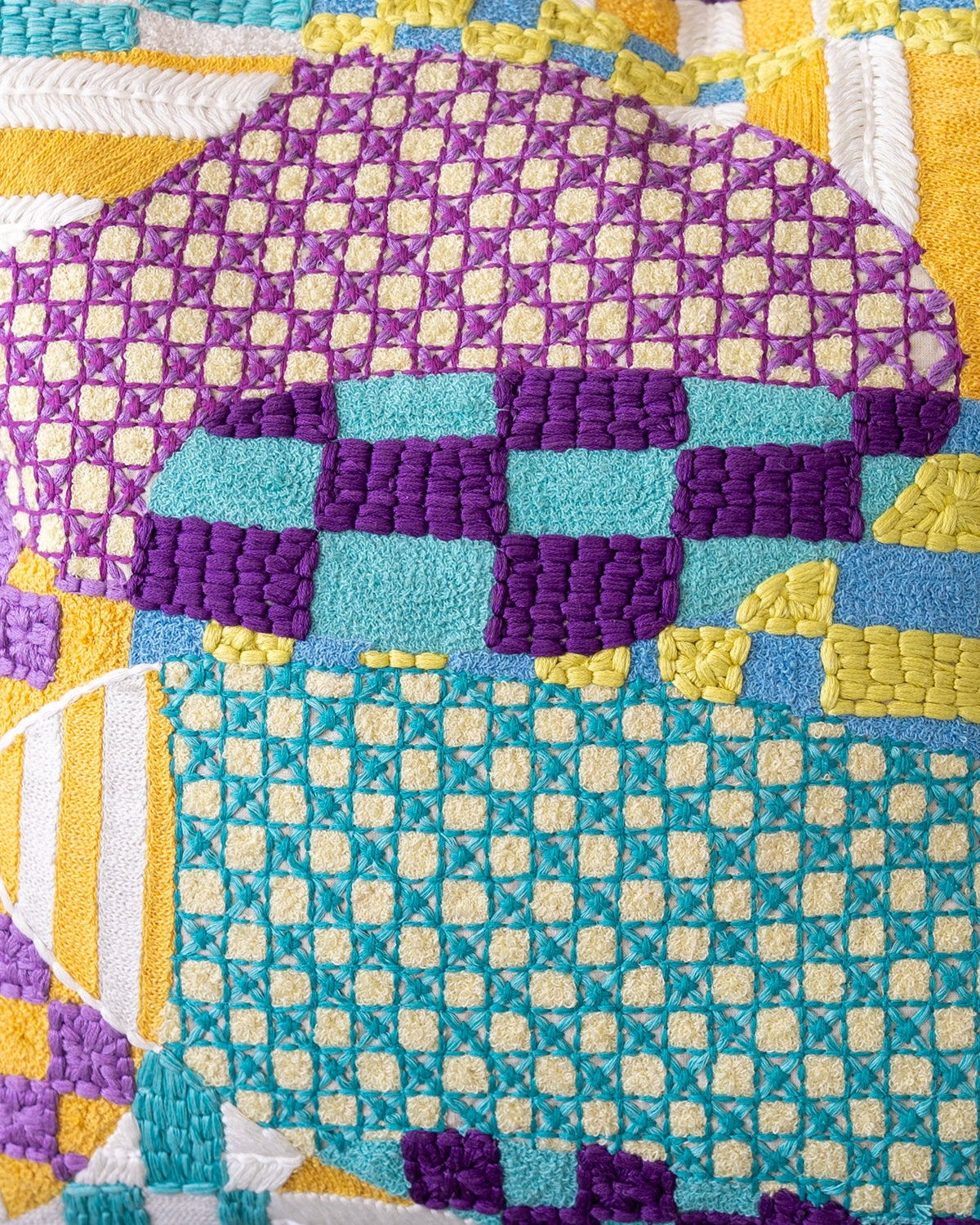 Ryan Organic Cotton Checkered Throw Pillow, styled on a sofa