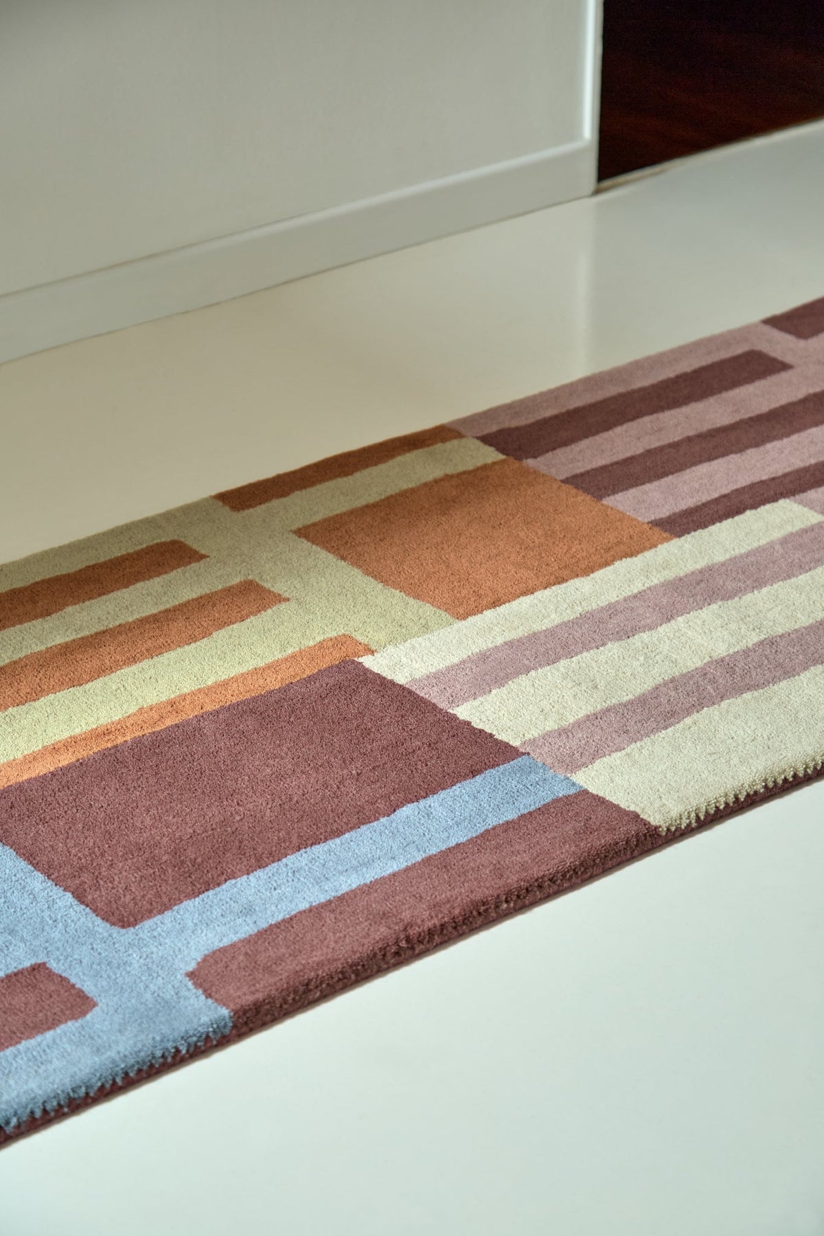 Brink and Campman Monolith Cinnabar/Amber Multi Area Rug by Harlequin