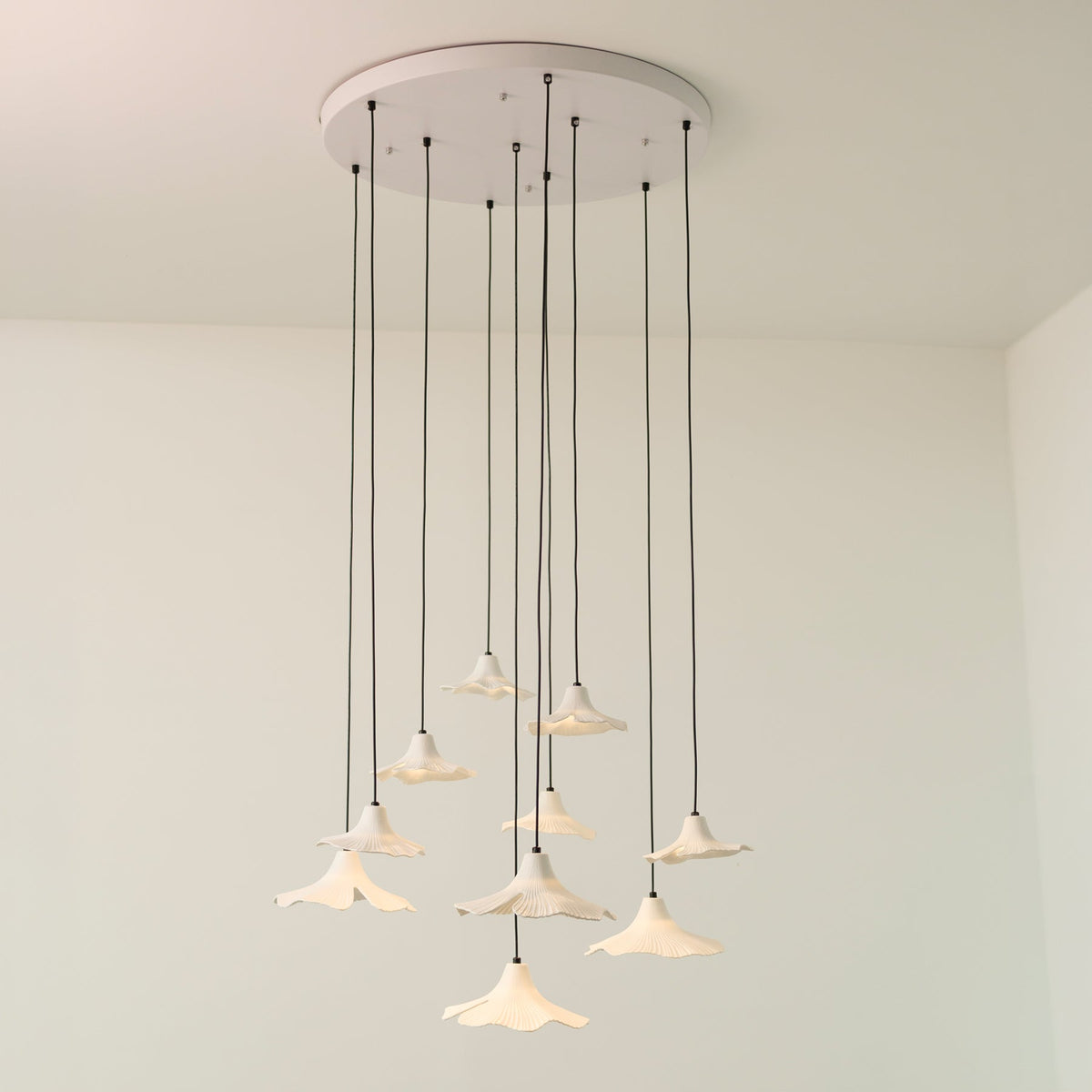 Sculptural Porcelain Ginkgo Leaf Wabi-sabi Pendant Light, styled in a hallway