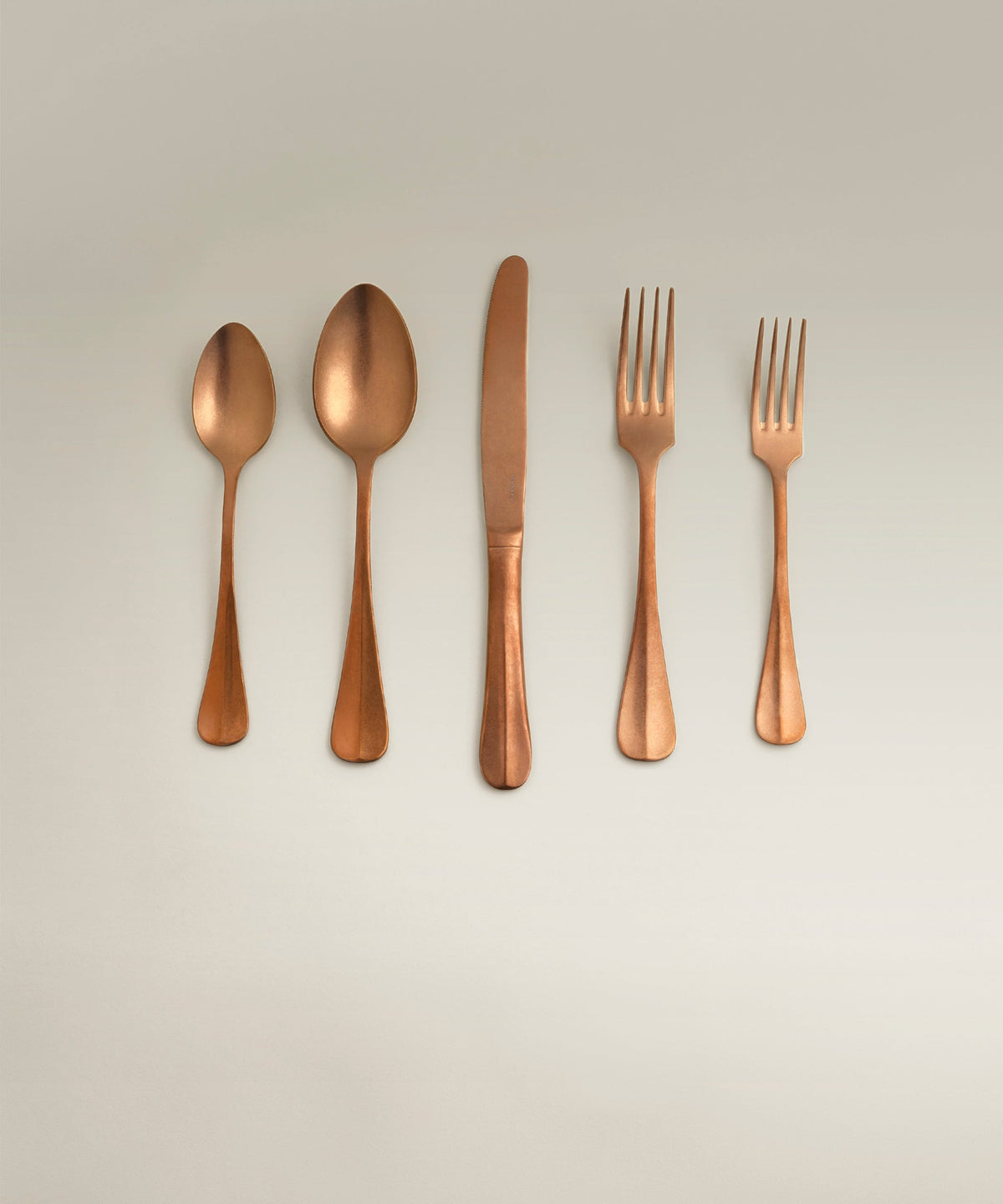 Sea Cliff Four-Person Flatware Set, copper, full set laid out