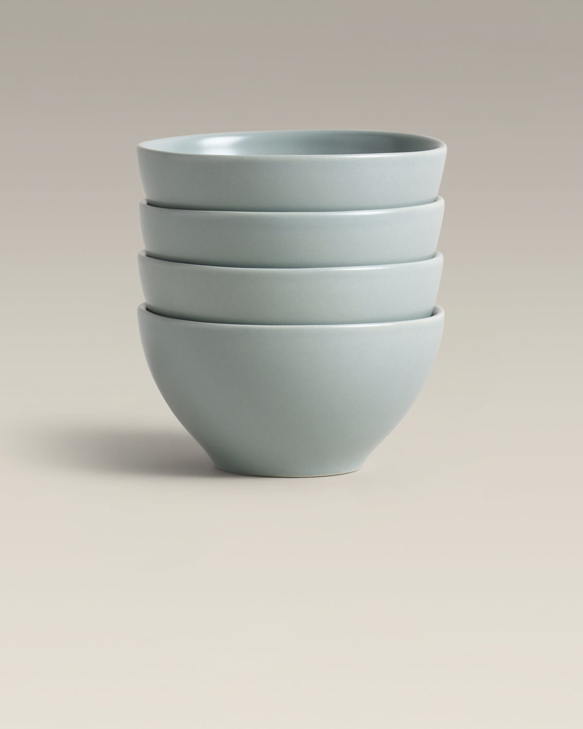 Stoneware Mini Bowl Set, held in hand for scale