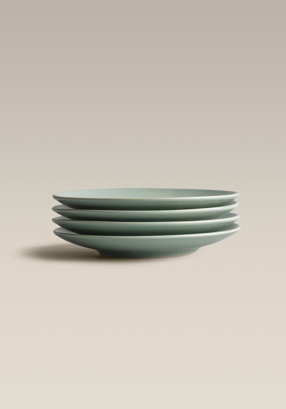 Stoneware Treat Plate Set, Palm, second held in hand for scale