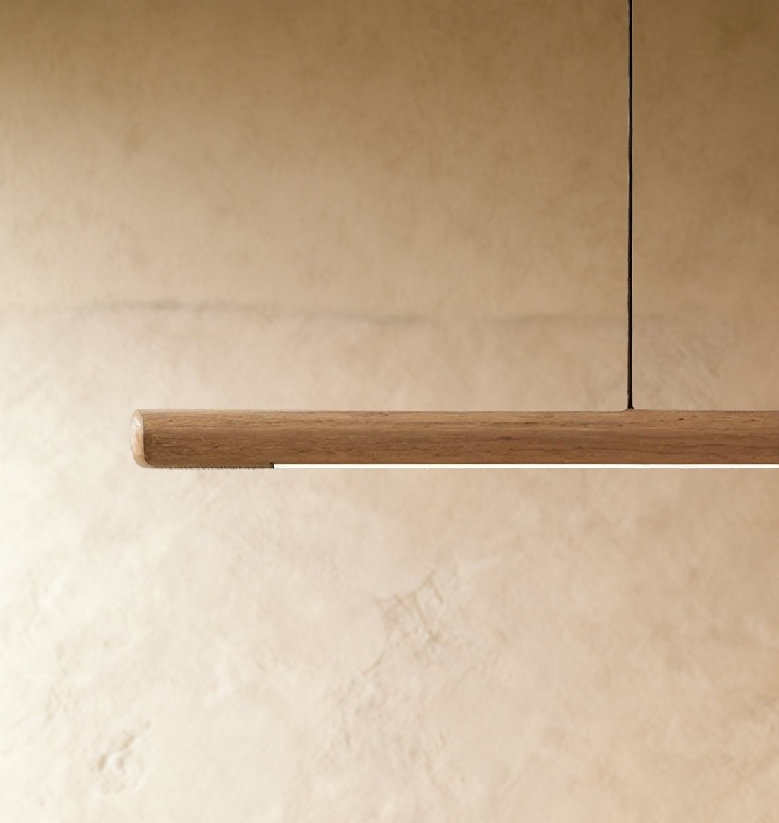 Svelte Walnut Pendant Light, glow and light quality close up