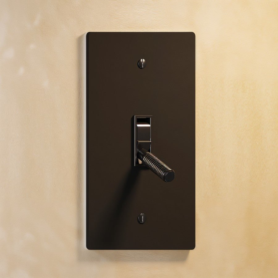 The Architectural Brass 4-Way Toggle Switch (1 to 5 Gang), installed on the wall (2)