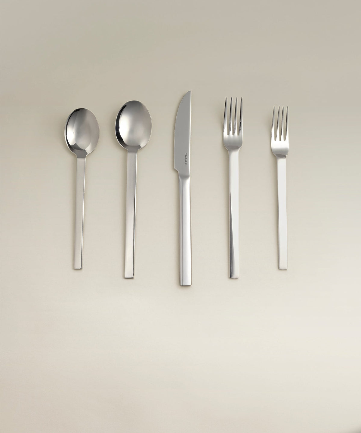 Tomales Four-Person Flatware Set, polished, single piece on a plain surface