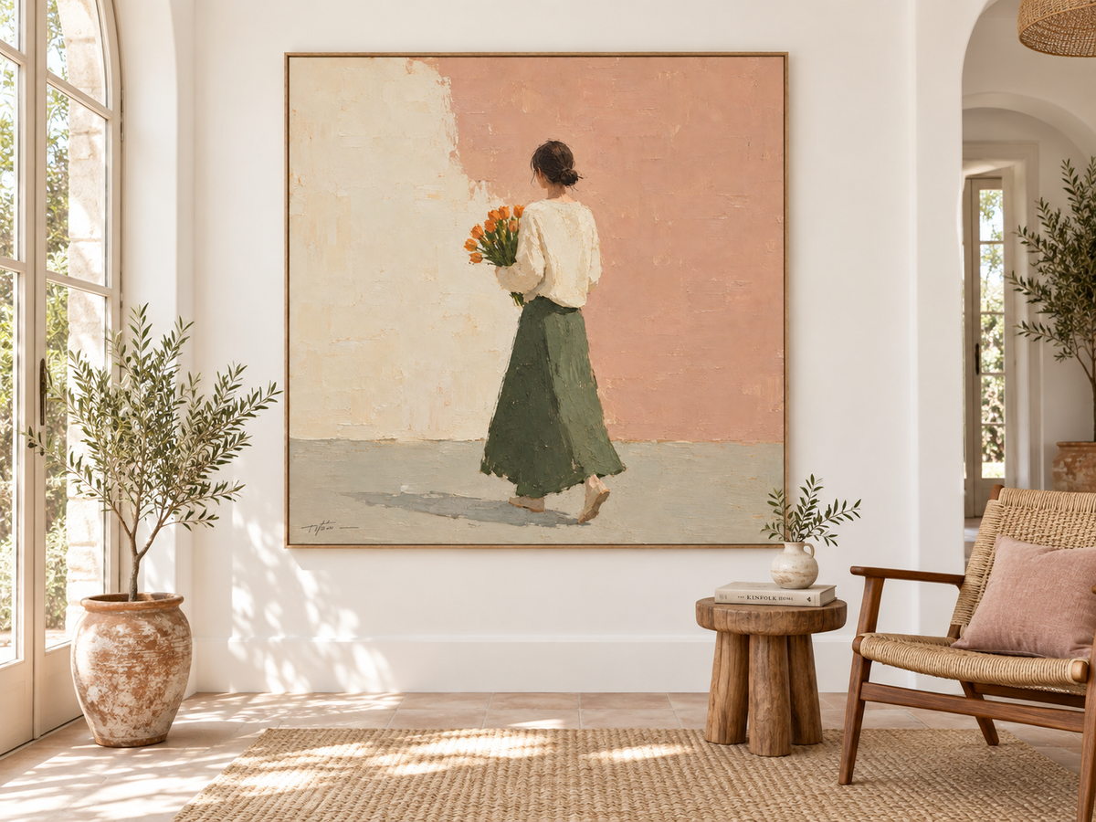 Woman with Orange Tulips Canvas Art, framed and hung on a wall