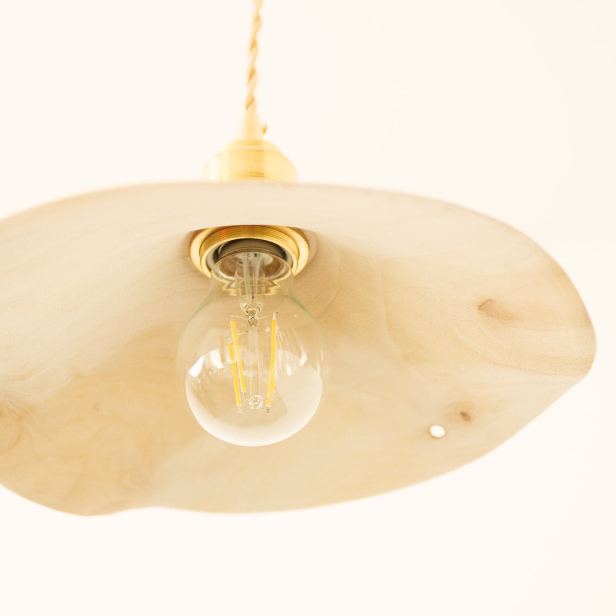 Yakusugi Wabi-sabi Wood Pendant Light, scale beside a doorway