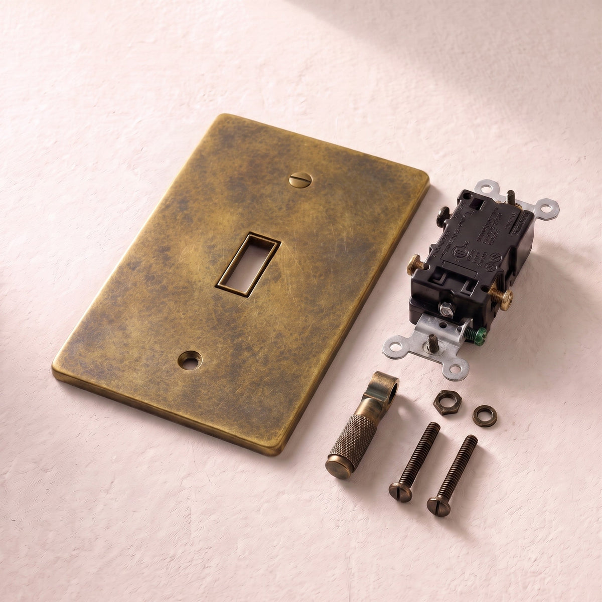Brass Electrical Sample Kit, held in hand for scale