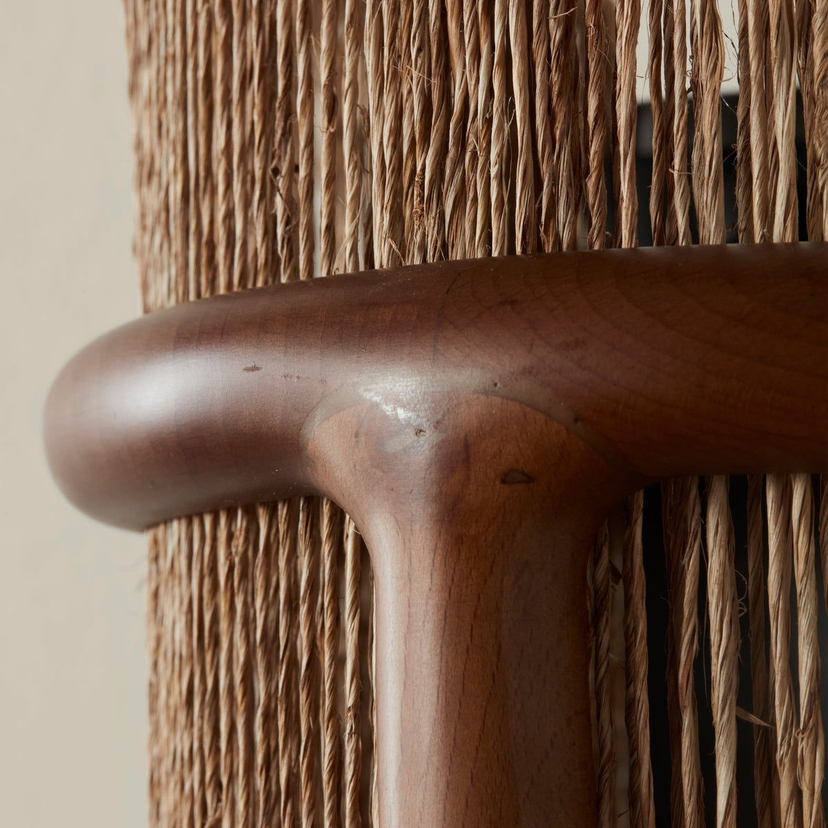 Cala Jute Wall Sconce, warm glow when lit