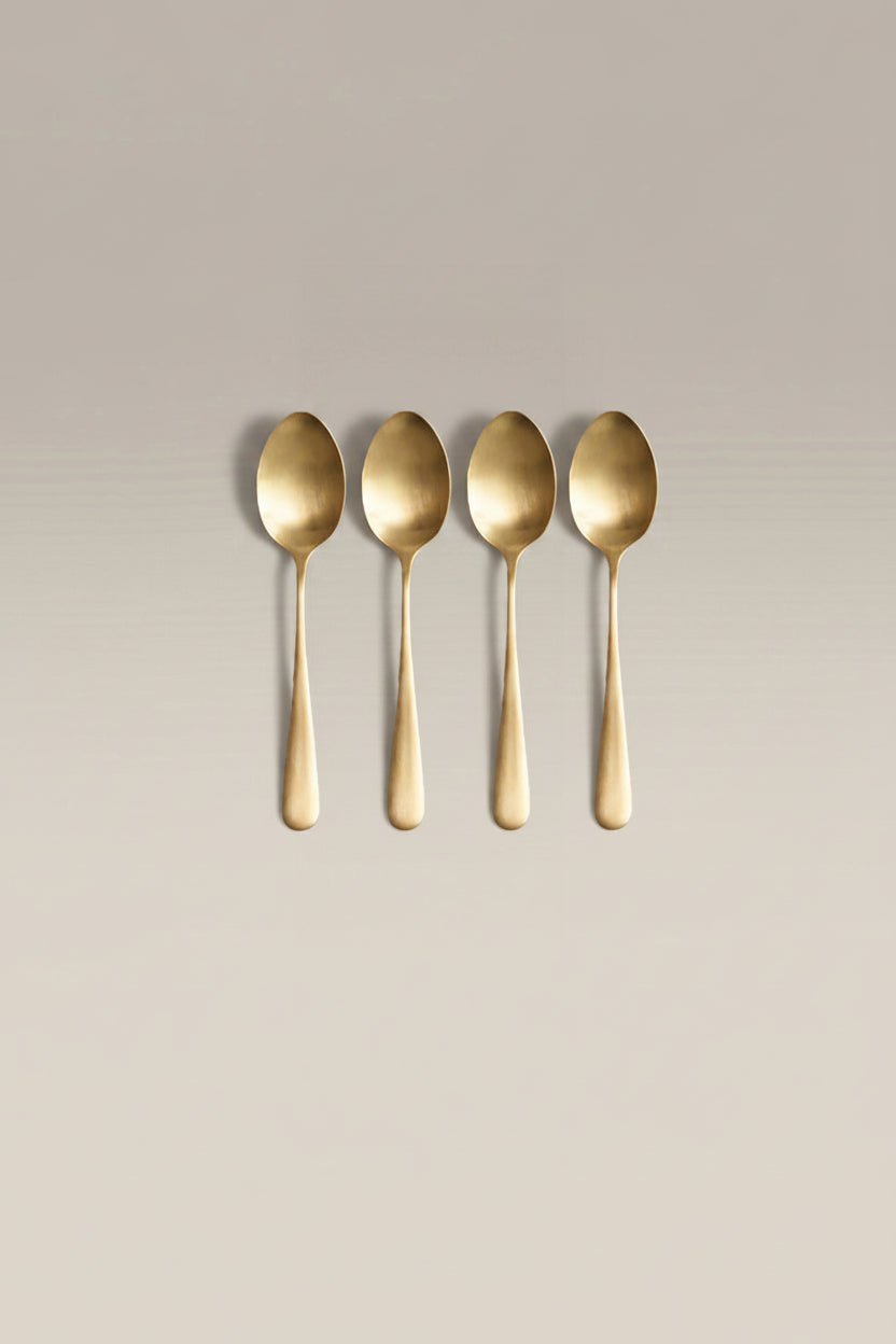 Classic Small Spoon Set, gold, single piece on a plain surface