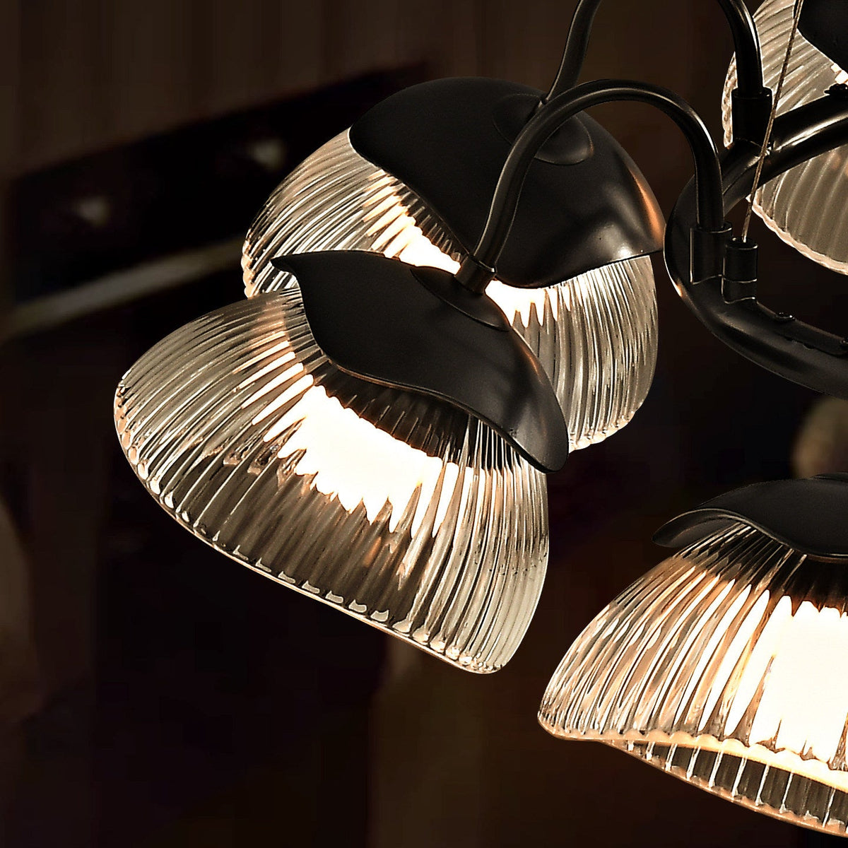 Coronis Fluted Glass LED Chandelier, second scale against a ceiling