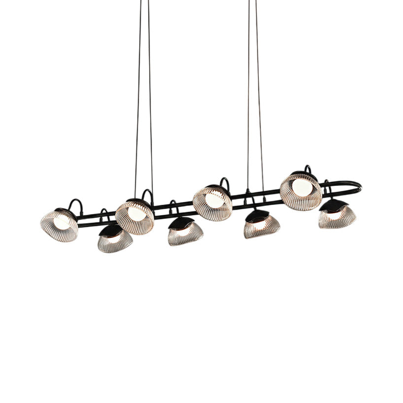 Coronis Linear Fluted Glass LED Chandelier, lit in a styled room