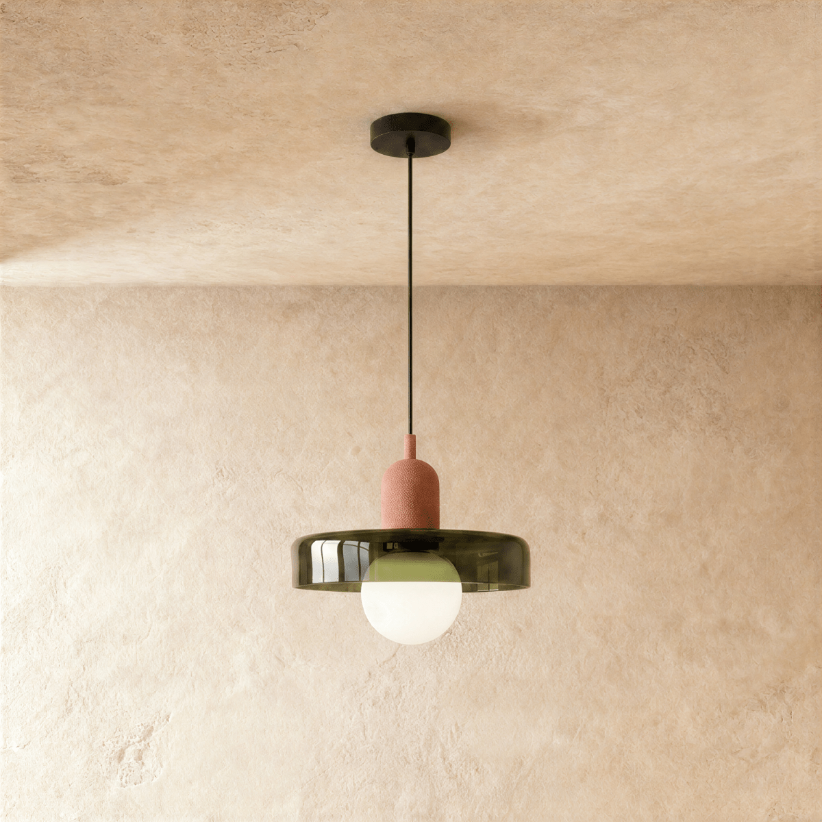Cride Metal Pendant Light, third lit and hanging in a styled room