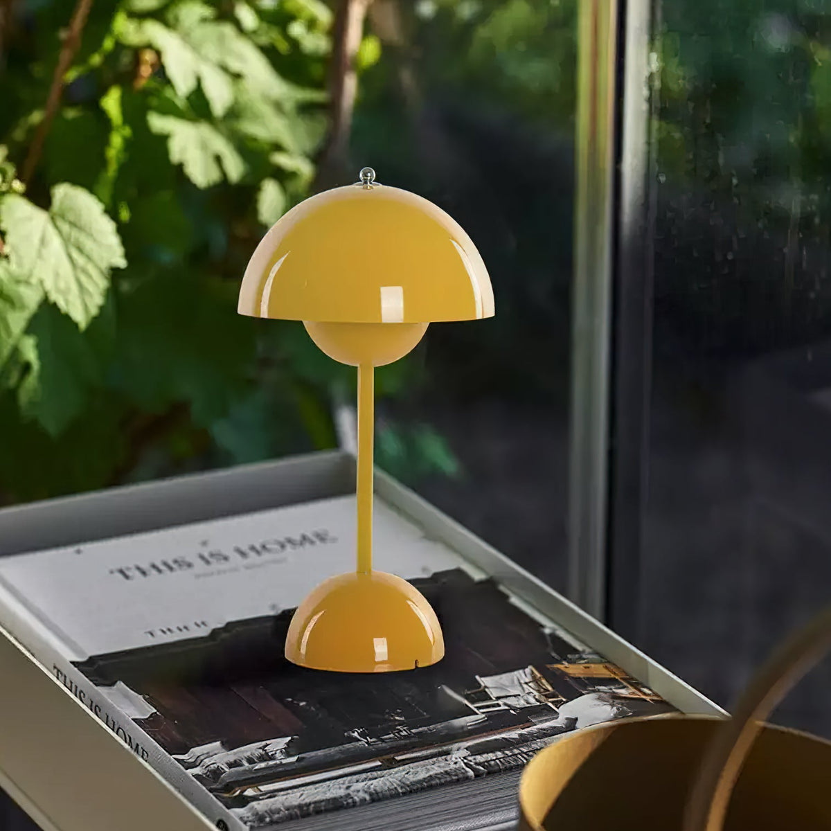 Duo Dome Portable Table Lamp, lit in a styled room 2