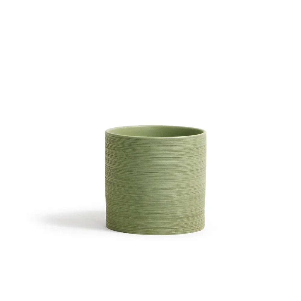 Etched Green Collection, styled on a shelf
