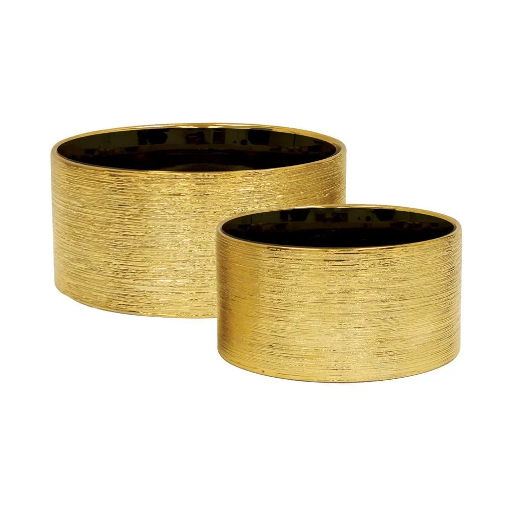Etched Metallic Gold Collection, styled with greenery