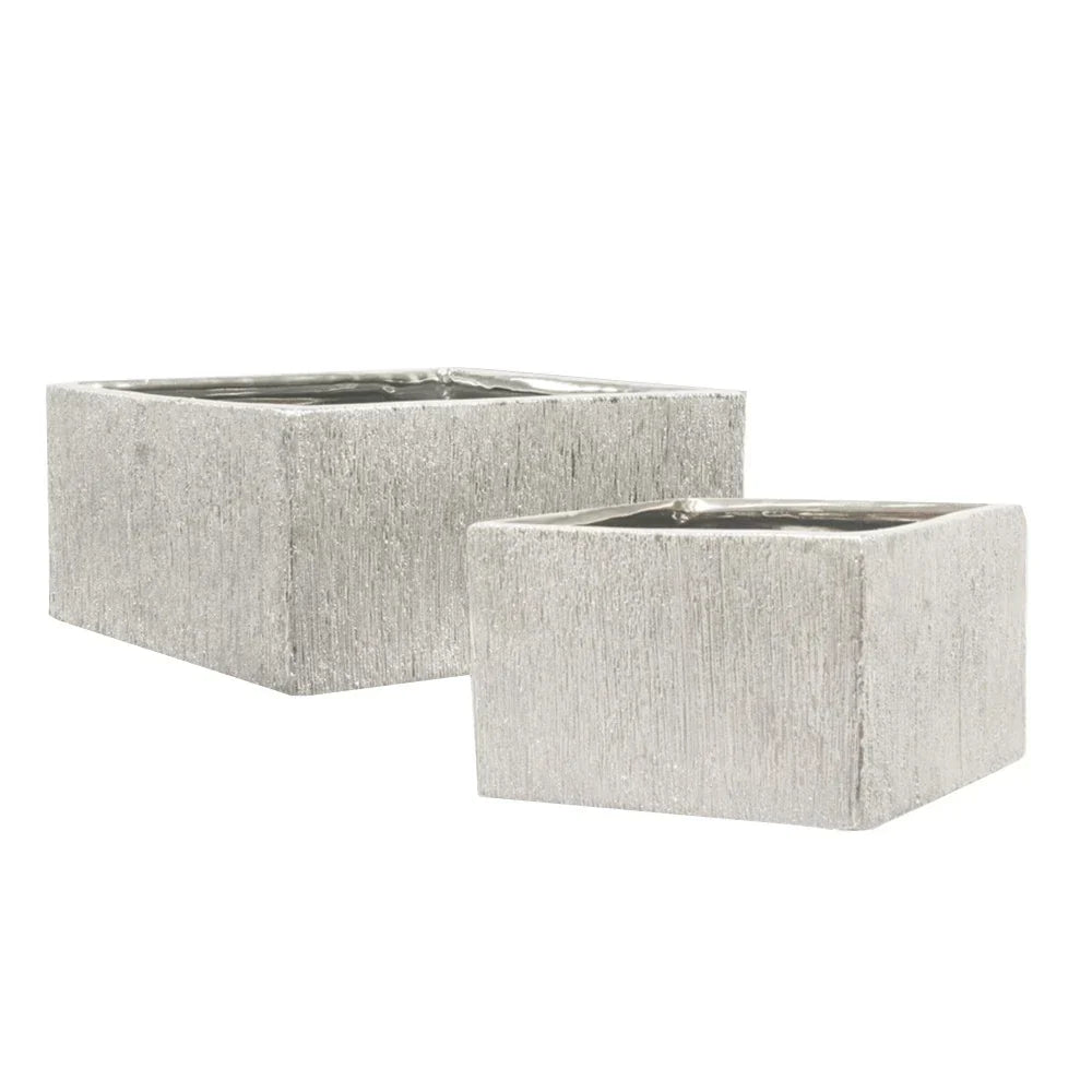 Etched Metallic Silver Collection, styled with greenery