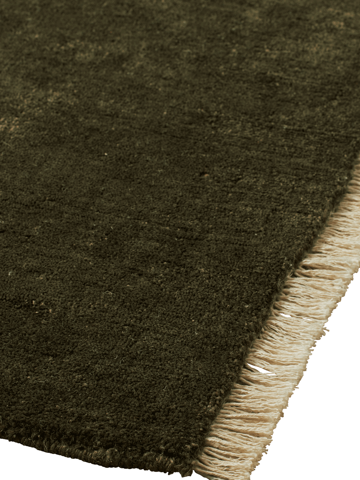 Firth Jute Rug, Dark Olive, underfoot in a living space