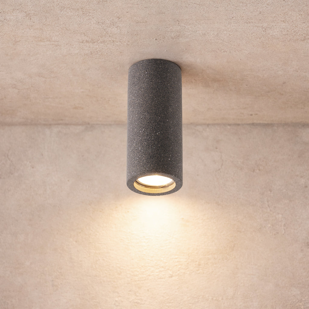 Lithos Minimalist Concrete Ceiling Light, lit after dark