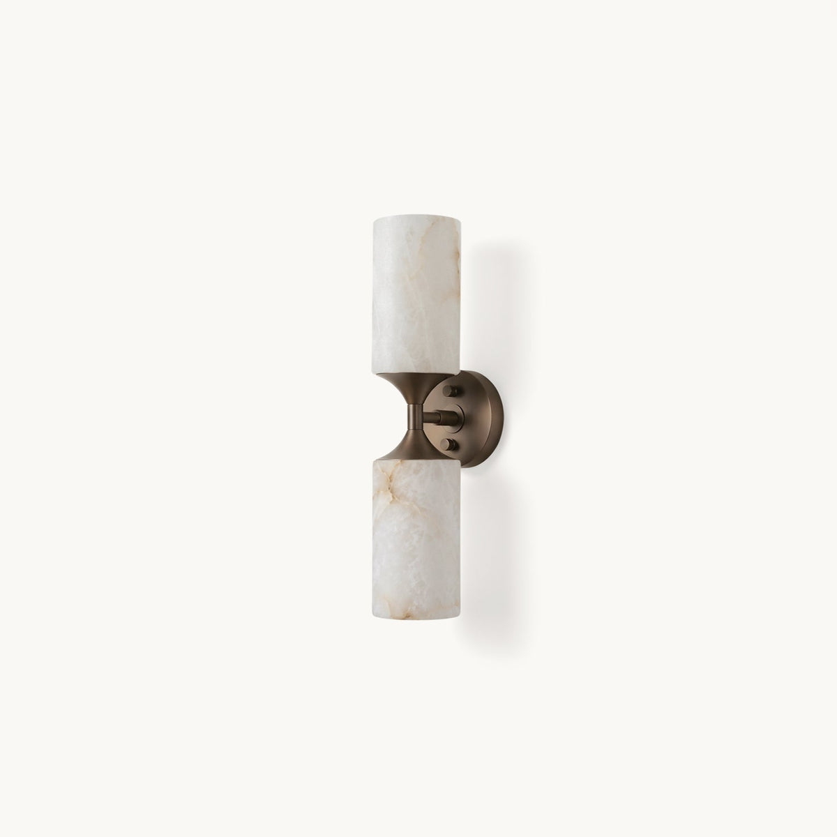 Merrick Alabaster Wall Sconce, lit in a styled room