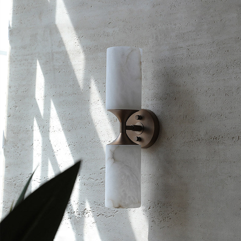 Merrick Alabaster Wall Sconce, second held for scale
