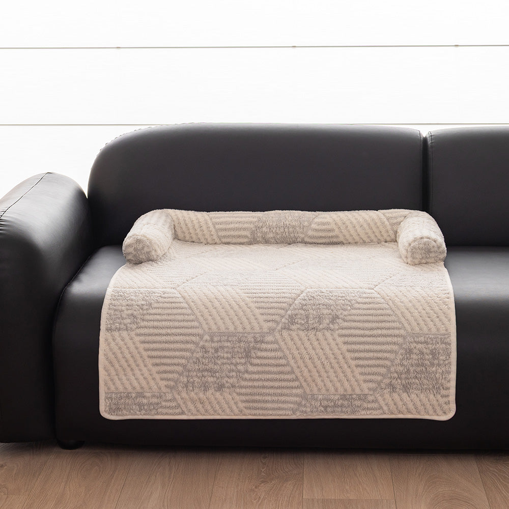 Patchwork Plush Bolster Pet Sofa Bed, with a pet resting on it