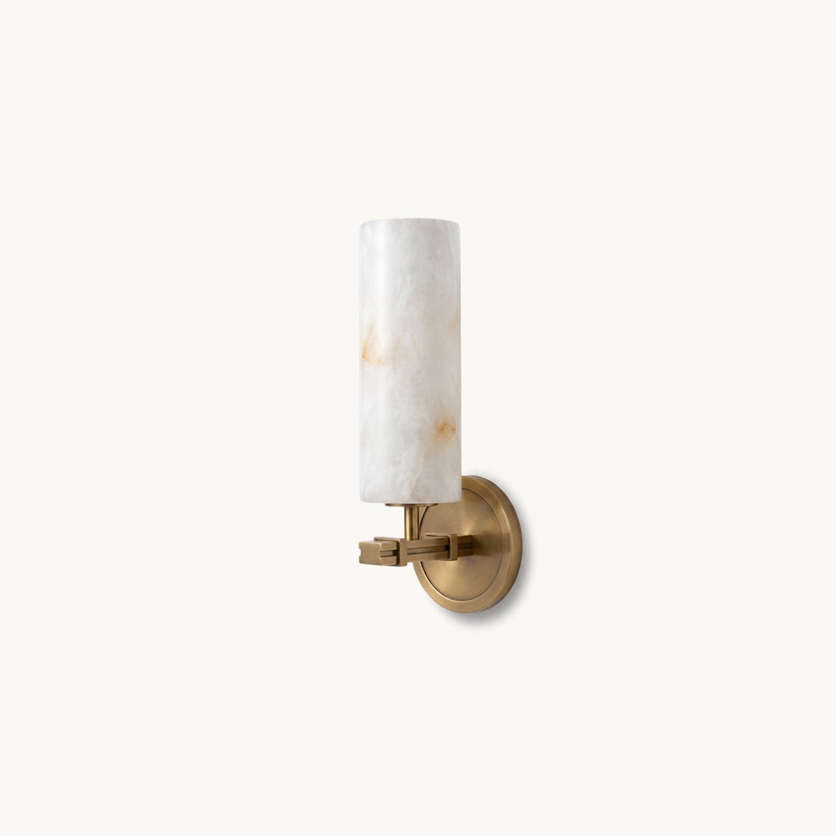 Ravelin Alabaster Wall Sconce, lit in a styled room