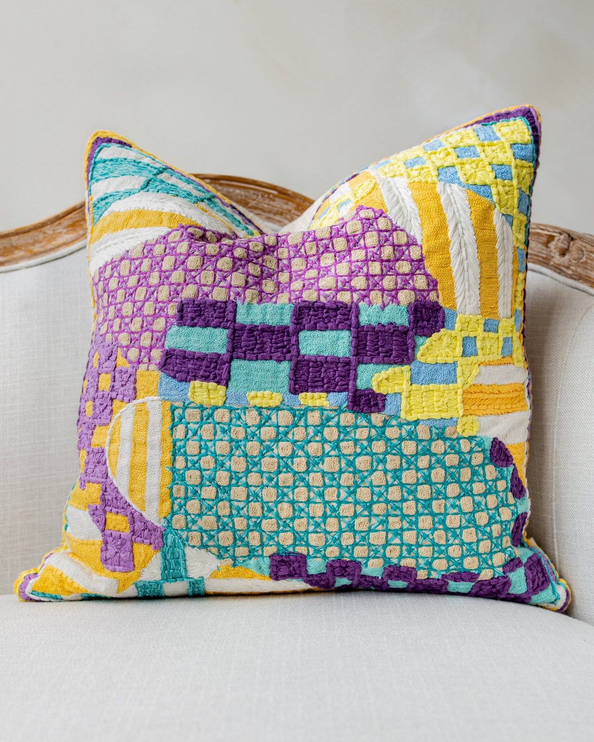 Ryan Organic Cotton Checkered Throw Pillow, draped and styled view