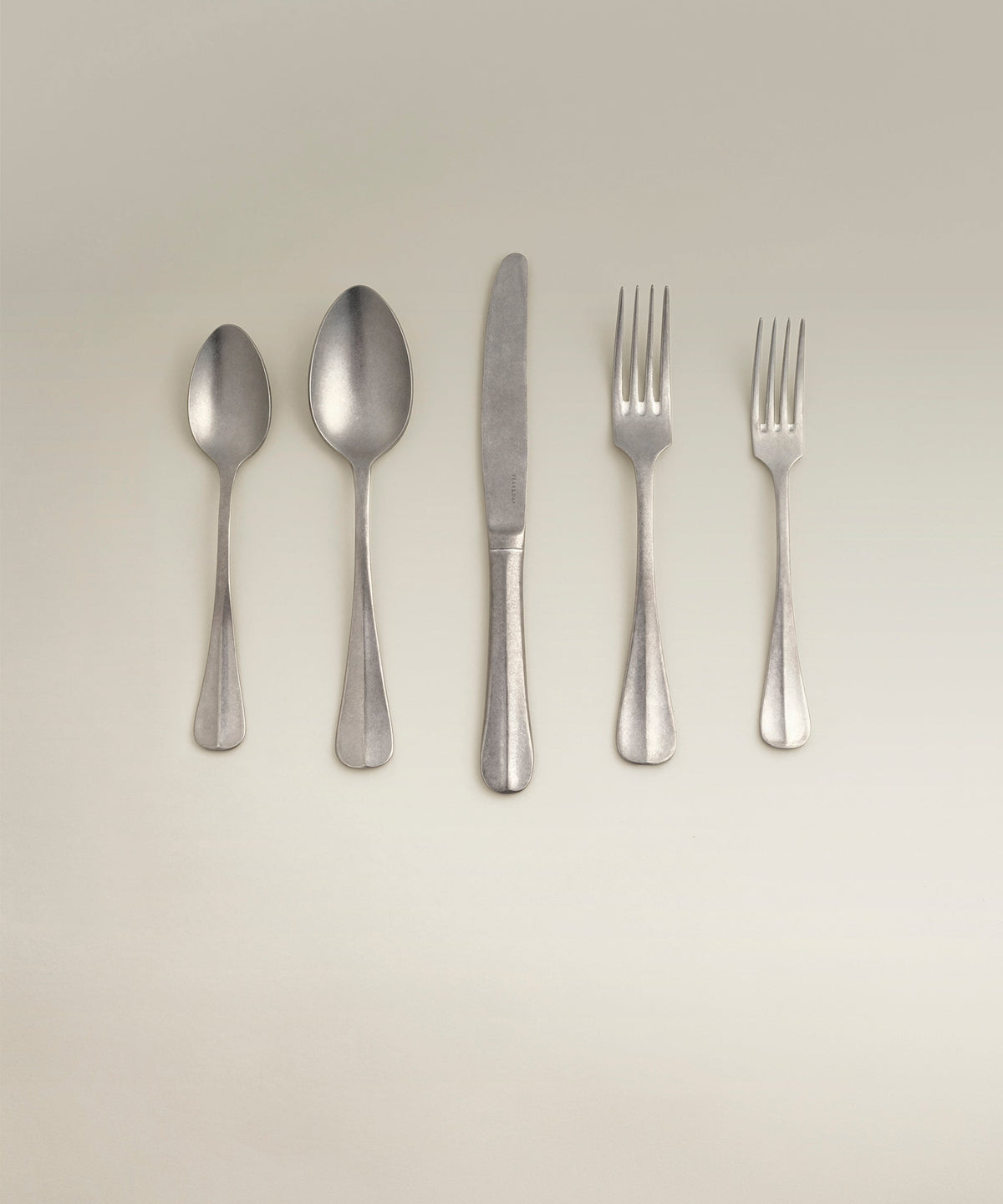 Sea Cliff Four-Person Flatware Set, place setting in use