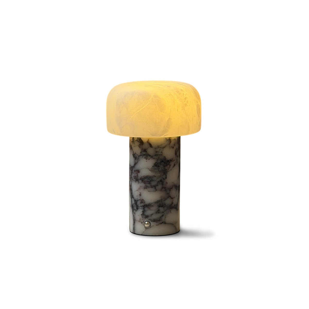 Sorvane Marble Alabaster Table Lamp, lit on a side table