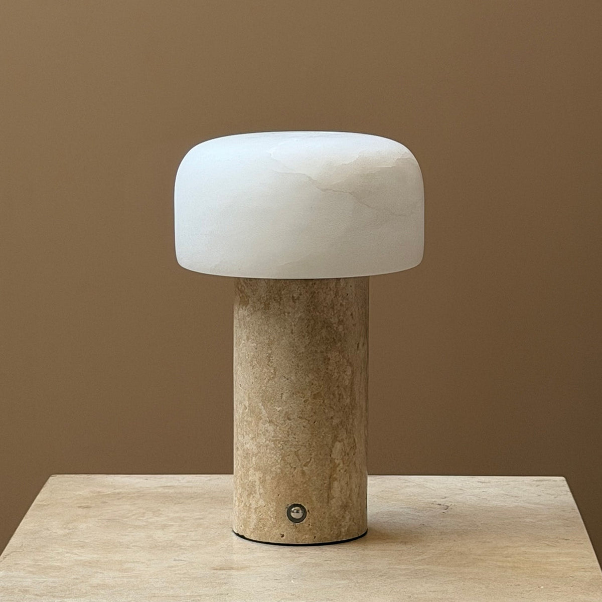 Sorvane Travertine Alabaster Table Lamp, third lit on a side table