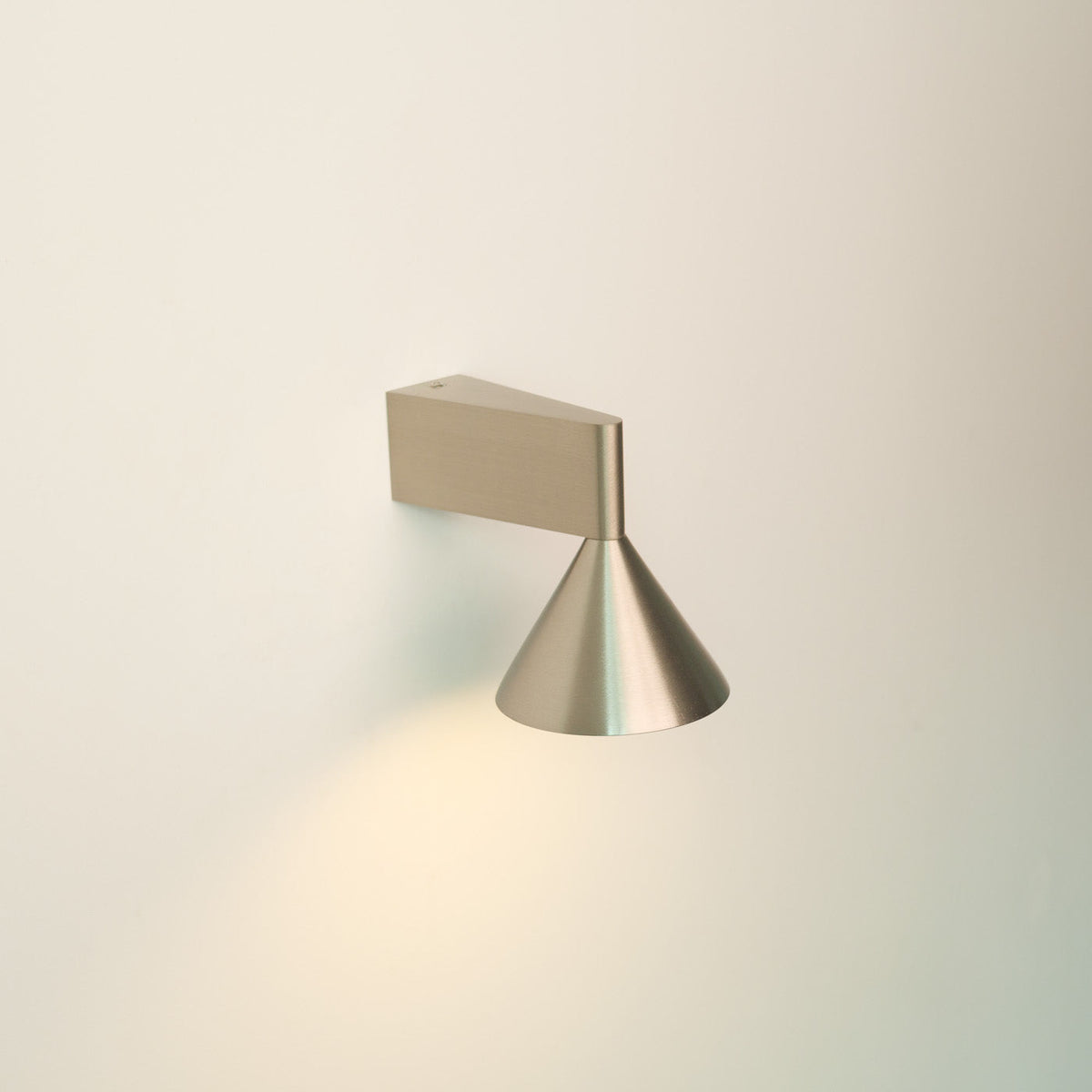 Staccato Modern Minimalist Wall Light, lit after dark